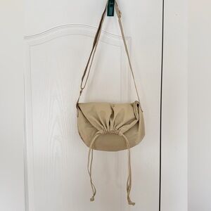 Uniqlo U drawstring bag (small / natural)